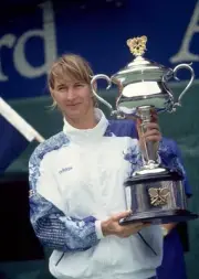 Steffi Graf of Germany poses with the trophy after defeating Arant- Old Photo 3