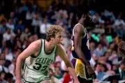 Larry Bird Boston Celtics hunches down next to "Big Game" James Wo- Old Photo