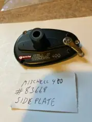 Abu Garcia Mitchell 400 Reel part #83668 Side Plate - NEW - See Photos