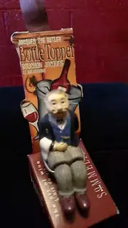 Collectable Bottle Topper Man Sitting on Jon