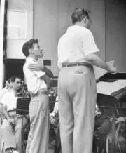 Singer Frank Sinatra singing as conductor Max Steiner begrudgi- 1940s Old Photo
