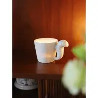 在飛比找ETMall東森購物網優惠-日本設計國內代工燭臺杯咖啡杯松鼠兔子造型多用陶瓷杯透光杯擺件