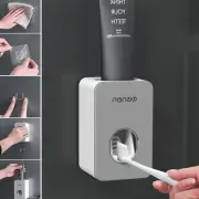 Toothpaste Dispenser Bathroom Wall-mounted Toothbrush Holder Automatic Rack