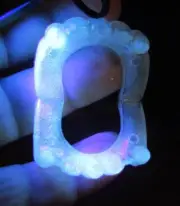 toy plastic kids vampire teeth, glow in under black light, small 1.75 inch wide