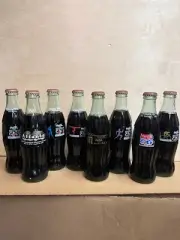 Coca-Cola Collectors Bottles- 8 Olympic bottles- 1996