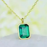 14k Yellow Gold Finish 3Ct Emerald Cut Simulated Green Emerald Solitaire Pendant