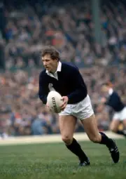 Scotland fly-half John Rutherford in action during the Rugby Unio - Old Photo