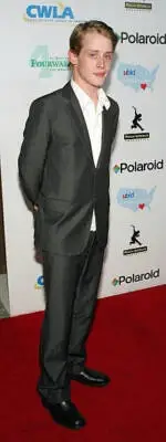 Actor Macaulay Culkin arrives at the launch of the uBid for Hurric - Old Photo