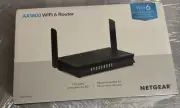 T-W-546 NIB NETGEAR(RAX20-100NAS) 4-Stream AX1800 WiFi 6 Router Black Dual Band
