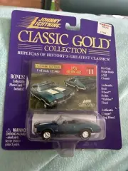 Olds 442 Convertible #11, Johnny Lightning Gold Diecast. Unopened