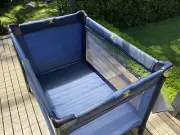 As new travel cot