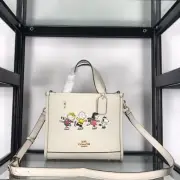 Coach X Peanuts Dempsey Women's Leather Tote Bag with Snoopy and Friends Motif