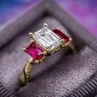2Ct Emerald Cut Lab Created Sapphire Three Stone Ring 14K Yellow Gold Plated