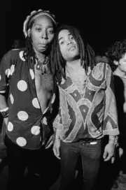 American musicians Michael Murch Powers Lenny Kravitz as they pose - Old Photo