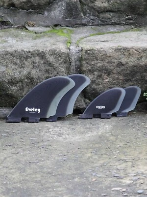 4.9" / 3.1" RM quad set four fins, black on natural Pro Glass. FCSII compatible.