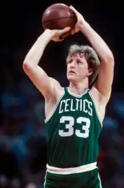 Boston Celtics' center Larry Bird shoots1980's Basketball photo
