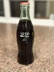 6.5 oz COCA COLA COMMEMORATIVE BOTTLE 1990 INTERNATIONAL CHRISTMAS PAKISTAN COKE