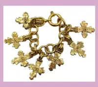 在飛比找Yahoo!奇摩拍賣優惠-CHANEL VINTAGE 十字架金色手鍊手環