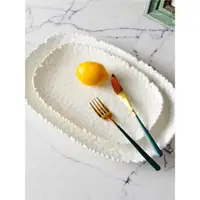 在飛比找ETMall東森購物網優惠-北歐家居簡約白色9/14英寸陶瓷盤美食盤水果擺盤餐盤橢圓盤 