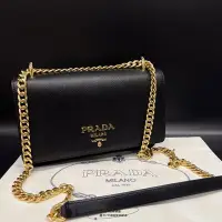 在飛比找Yahoo!奇摩拍賣優惠-JR精品PRADA Woc 黑色防刮牛皮金字金鍊釦式翻蓋肩背