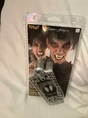 SPIRIT HALLOWEEN VAMPIRE FANGS-NEW