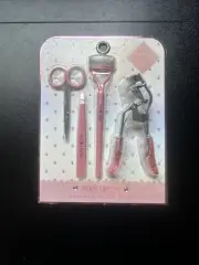 Paris Hilton Essential Beauty Tools 4pc Set Scissors Tweezers Lash Comb Curler