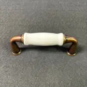 3" Flare Foot Antique Copper Pull with White Ceramic Insert
