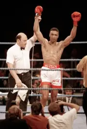 Michael Watson of England is declared the winner by referee John C- Old Photo