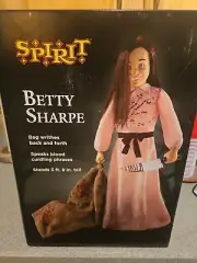 Spirit Halloween Betty Sharpe Animatronic Prop - Swinging Bloody Bag & Knife