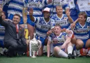 Wigan captain Ellery Hanley celebrates with his team the trophy af- Old Photo