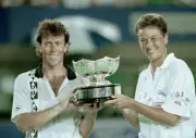 Jeremy Bates Jo Durie of Great Britain lift their trophy after win- Old Photo