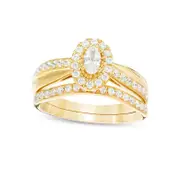 0.75 CT. T.W. Oval Natural Diamond Frame Crossover Bridal Engagement Ring Set in Solid 14K Gold