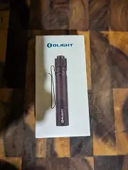Olight I3T EOS 180 Lumens EDC Carbon Fiber Torch (Sealed)