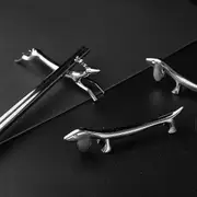 4 pieces of cutlery holders for knives, forks and spoons, motif dancing deer, silver-coloured