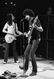 Thin Lizzy guitarist Gary Moore and singer Phil Lynott during The - Old Photo