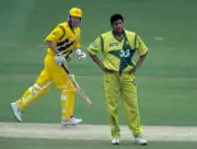 Pakistan bowler Wasim Akram looks frustrated as Australian ba- Old Cricket Photo