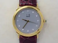 在飛比找Yahoo!奇摩拍賣優惠-《寶萊精品》dunhill 登喜路金灰白圓型石英女子錶