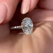 4.50 CT Oval Moissanite Hidden Halo Claw Prong Engagement Ring 14k White Gold