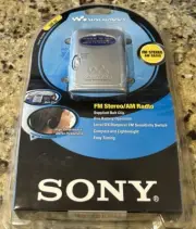 Sony SRF-59 AM/FM Walkman Radio Silver W/ Headphones/Belt Clip NEW SEALED