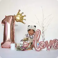 在飛比找momo購物網優惠-小皇冠草寫LOVE週歲生日鋁模氣球組1組(生日氣球 派對 氣