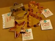 NWT Set of 4 Wilton Cookie Cutters Christmas Trees Star Gingerbread Boy 1" high