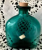 4.25" H X 3"W GREEN GLASS BOTTLE W/CORK