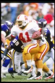 Running back Reggie Brooks Tampa Bay Buccaneers moves the ball - 1996 Old Photo