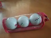 Coca Cola 3 Dunlop Tour Golf balls and case with clip.