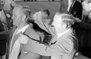 Jack Nicklaus victorious receiving green blazer from Arnold Palmer- Old Photo