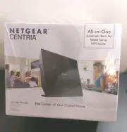 Netgear WNDR4700-100NAS Centria All-in-One Media Server WiFi Storage Router...