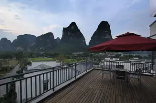 水悦龍灣酒店(陽朔遇龍河十裏畫廊景區店)Shuiyue Longwan Hotel (Yangshuo Yulong River Ten-mile Gallery)