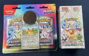 Pokémon Prismatic Evolutions Evee Coin & 2 Pack &1 Terrestrial Festival Booster