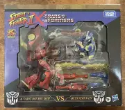 Transformers X Street Fighter Hot Rod (Ken) VS Arcee (Chun-Li) 2-Pack New