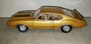 ACME: 1:18 DR OLDS 1970 OLDSMOBILE 442 IN GOLD- RELEASE #1 IN THE SERIES